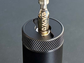 dynavap magnet and cap remover on travel storage debowler